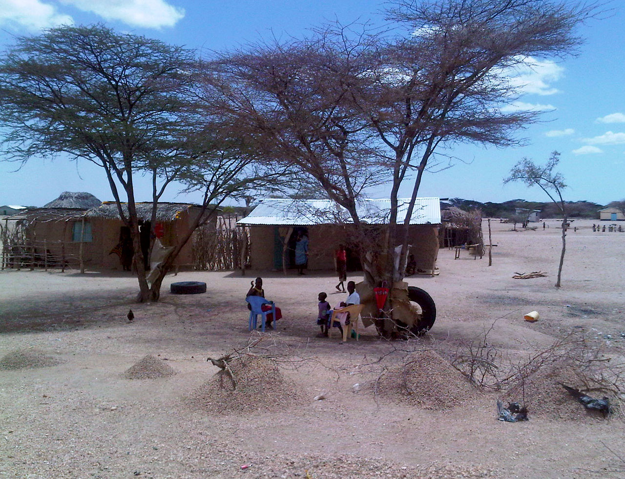 Kenyan family with a child symbolising adoption and family law