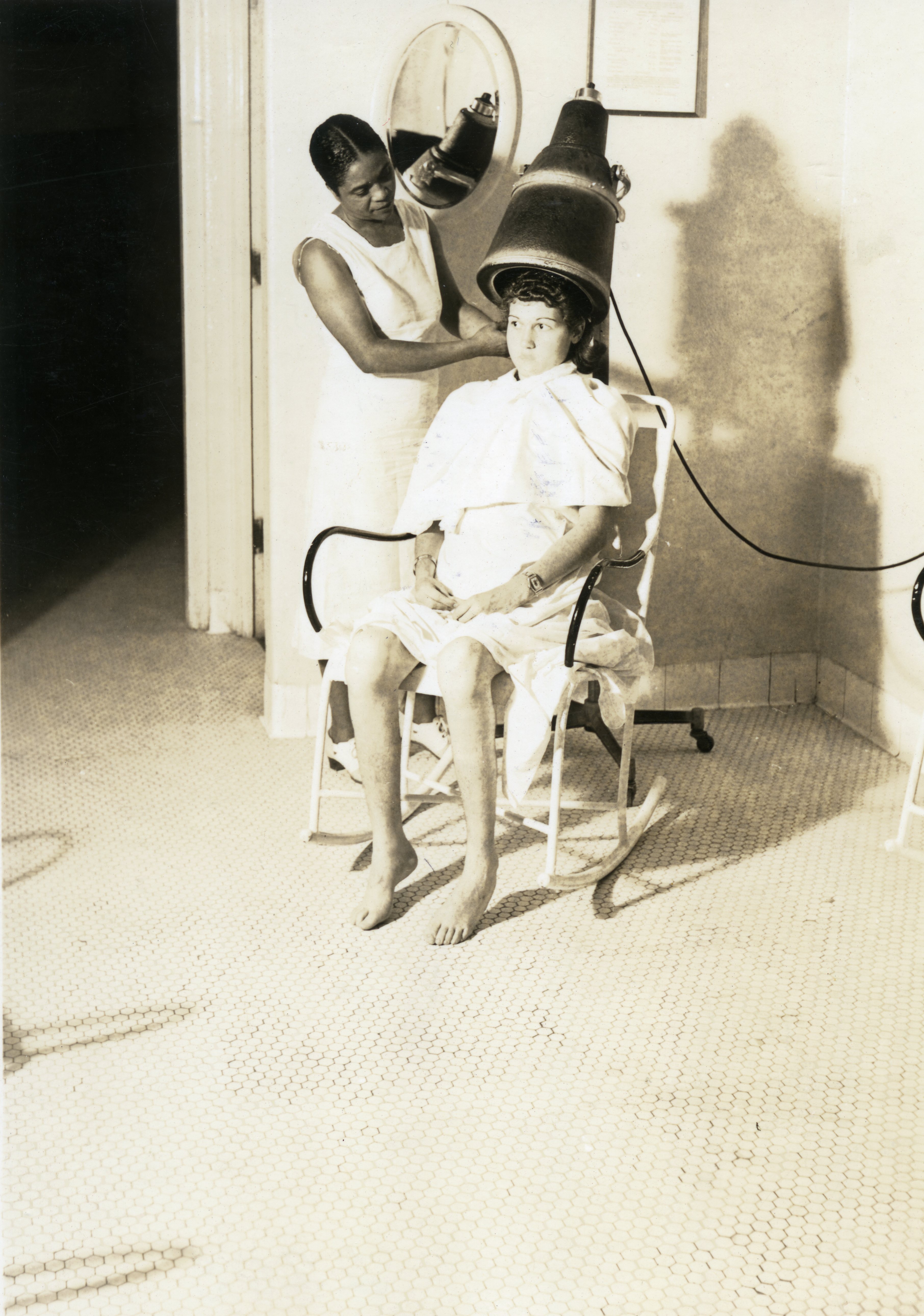 Customer receiving hair styling at a beauty salon
