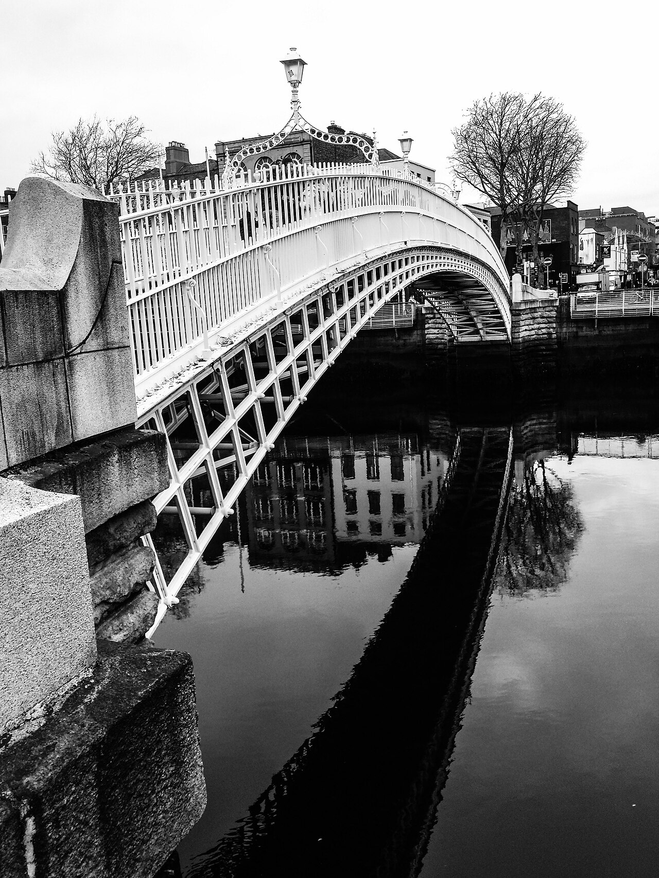 The Ha'penny Bridge over the River Liffey in central Dublin, Ireland